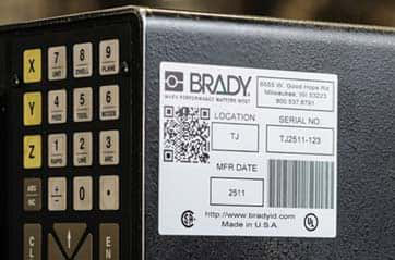 An adhesive label fixed to a metal product.