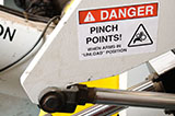 Machine equipment pinch point safety label.