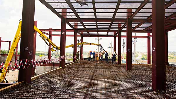 Construction of steel structures on concrete casting.