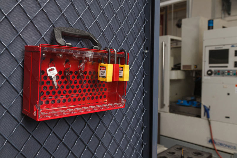 Keyed alike padlocks with their keys in a case