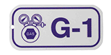 Close-up image of a white and purple valve tag labeled 'G-1' for gas valve identification.