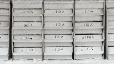 Frost-covered freezer drawers are neatly identified.